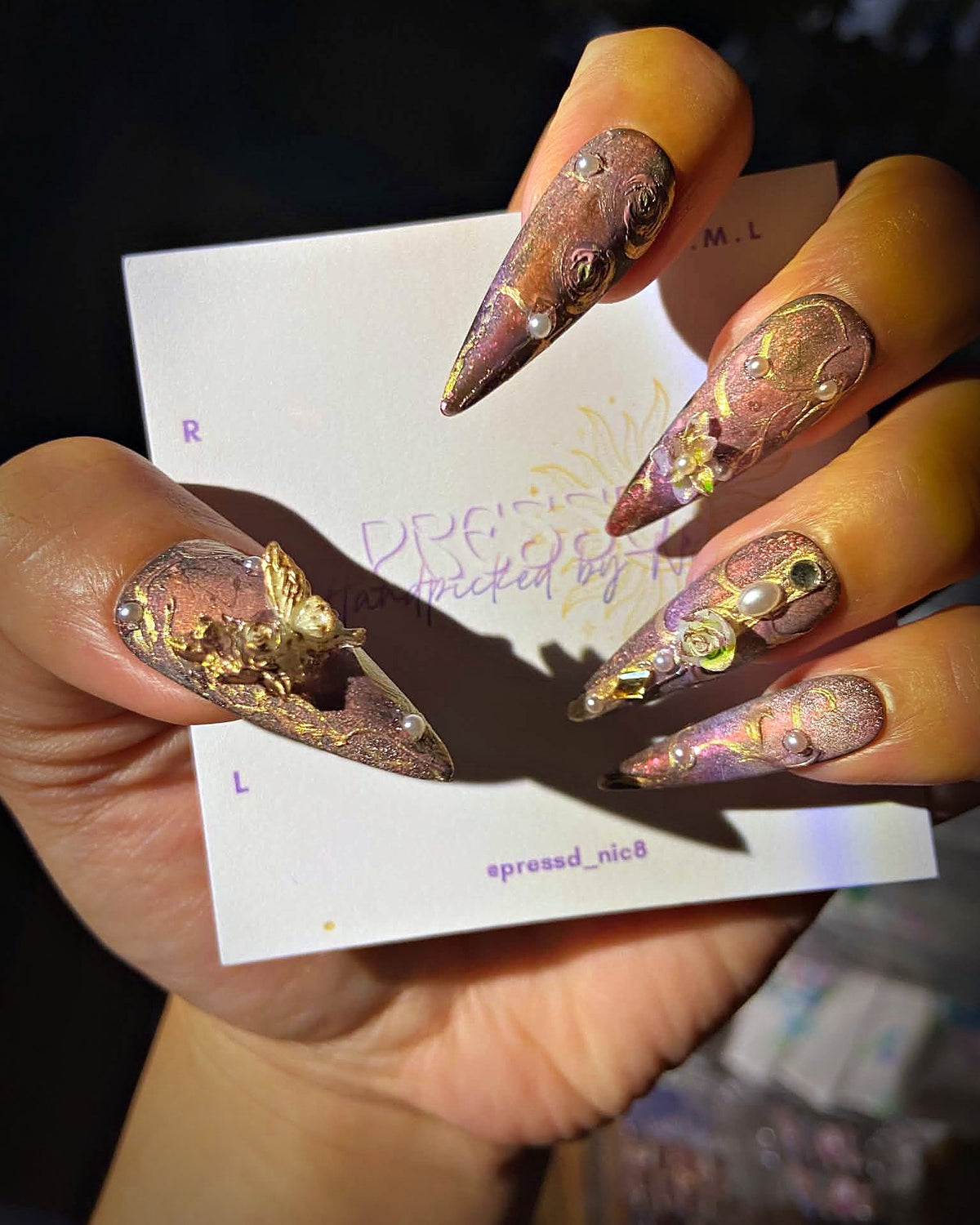 Gilded Bloom press-on nails: rose-bronze chrome stiletto nails with gold 3D details