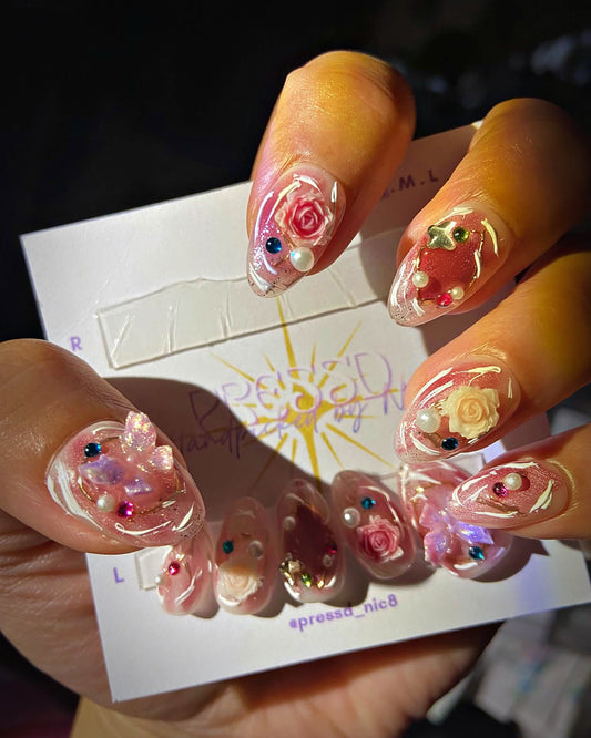 Rose Jelly press-on nails: pink jelly almond nails with 3D roses, crystals and pearls