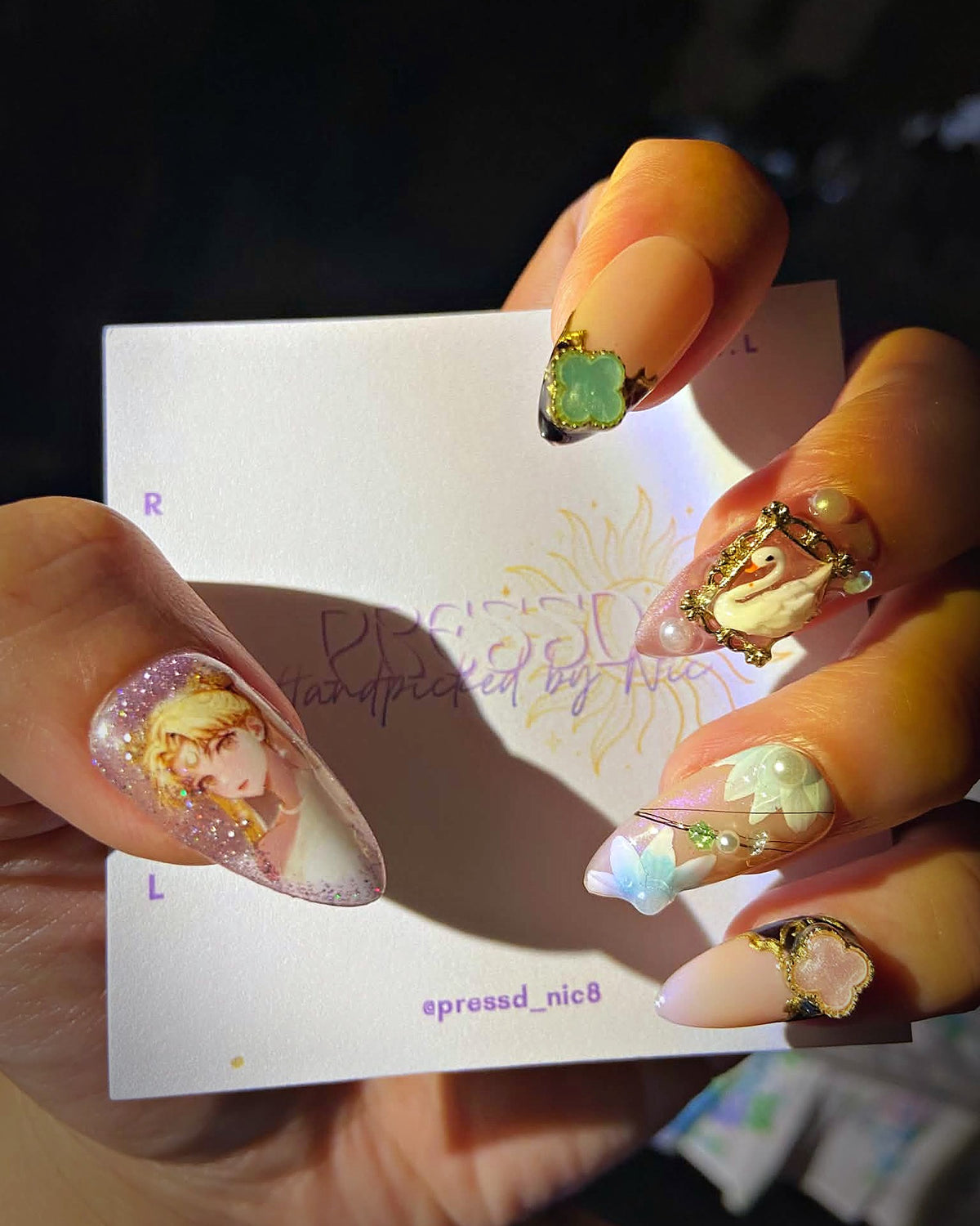 Storybook Charm press-on nails: hand-painted portrait accent nail with swan charm, jade stone and 3D flowers